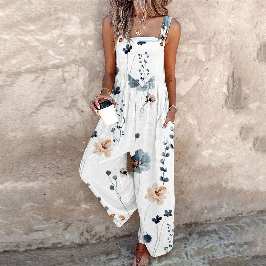 DIANA | SLEEVELESS FLORAL JUMPSUIT WITH GRACEFUL DRAPE