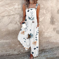 DIANA | SLEEVELESS FLORAL JUMPSUIT WITH GRACEFUL DRAPE