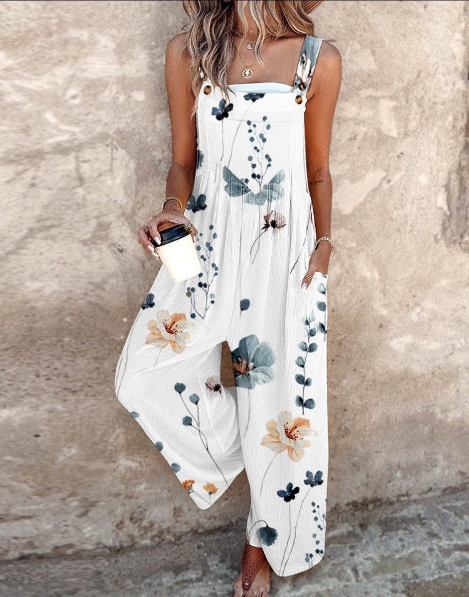 DIANA | SLEEVELESS FLORAL JUMPSUIT WITH GRACEFUL DRAPE