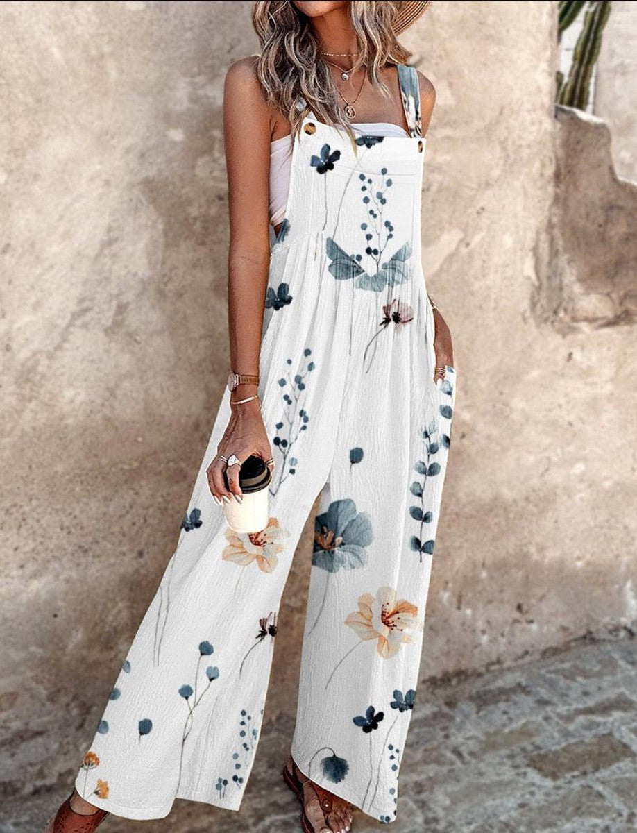 DIANA | SLEEVELESS FLORAL JUMPSUIT WITH GRACEFUL DRAPE