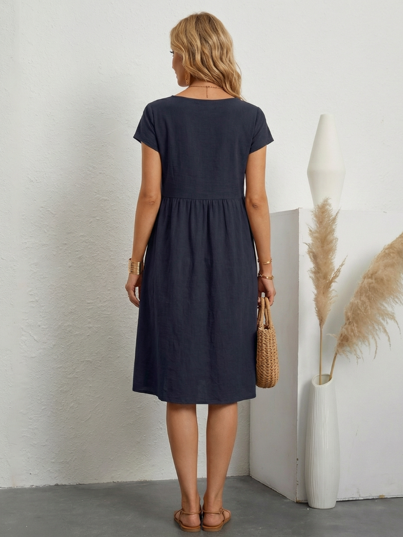 THEA | RELAXED FIT DRESS WITH FLATTERING POCKET DETAIL